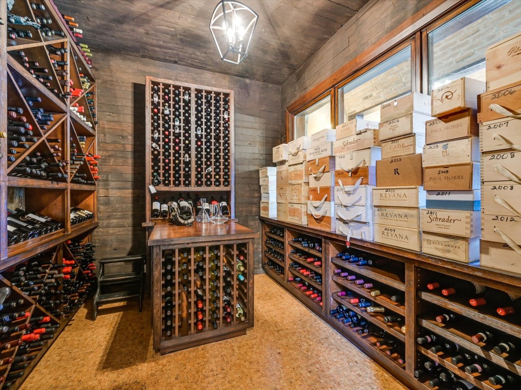 2515 Boot Ranch Circle Fredericksburg, TX 78624 - Photo 26 of 36 a view of a walk in closet with wooden floor