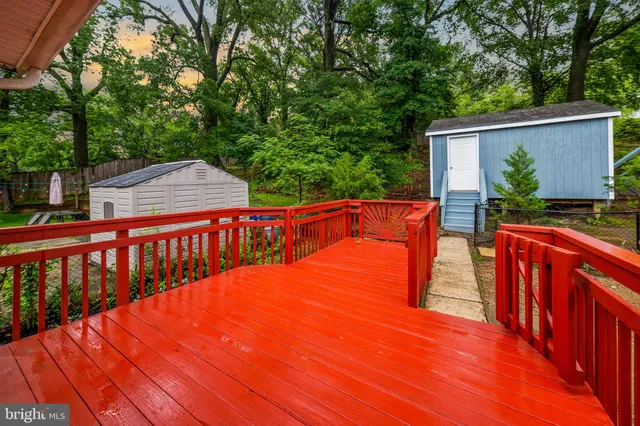 a view of balcony with deck and outdoor seating