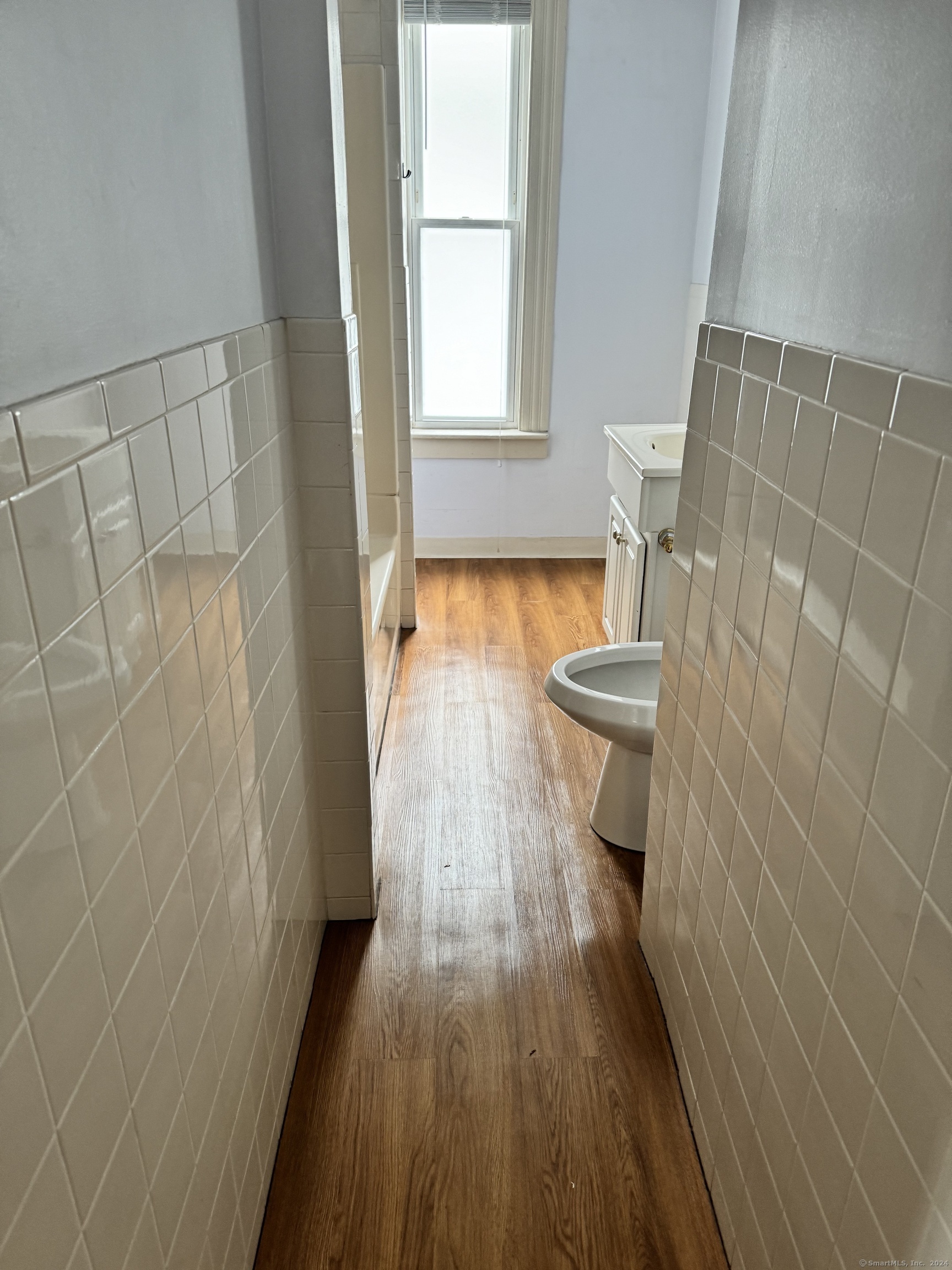 751 Orange Street New Haven, CT 06511 - Photo 14 of 18 a bathroom with a sink and a toilet