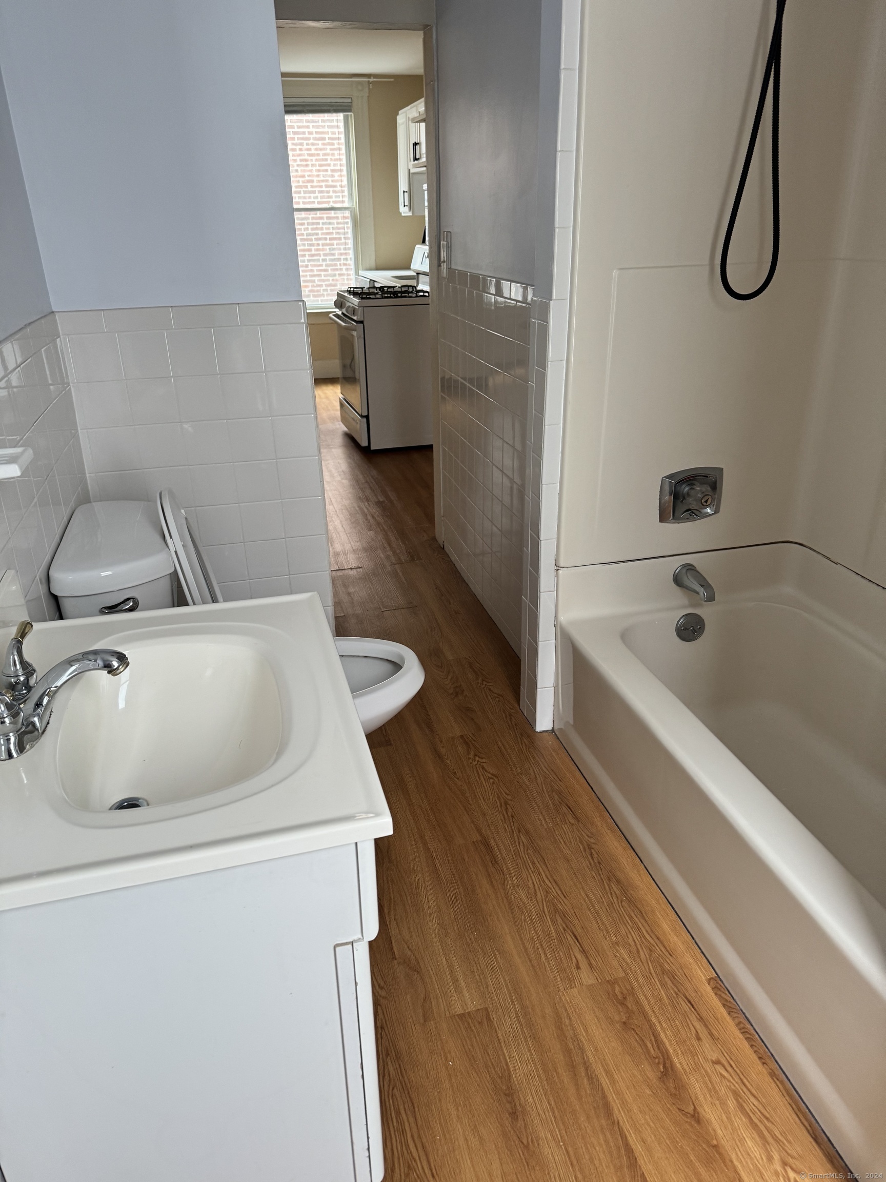 751 Orange Street New Haven, CT 06511 - Photo 16 of 18 a bathroom with a sink and a bathtub