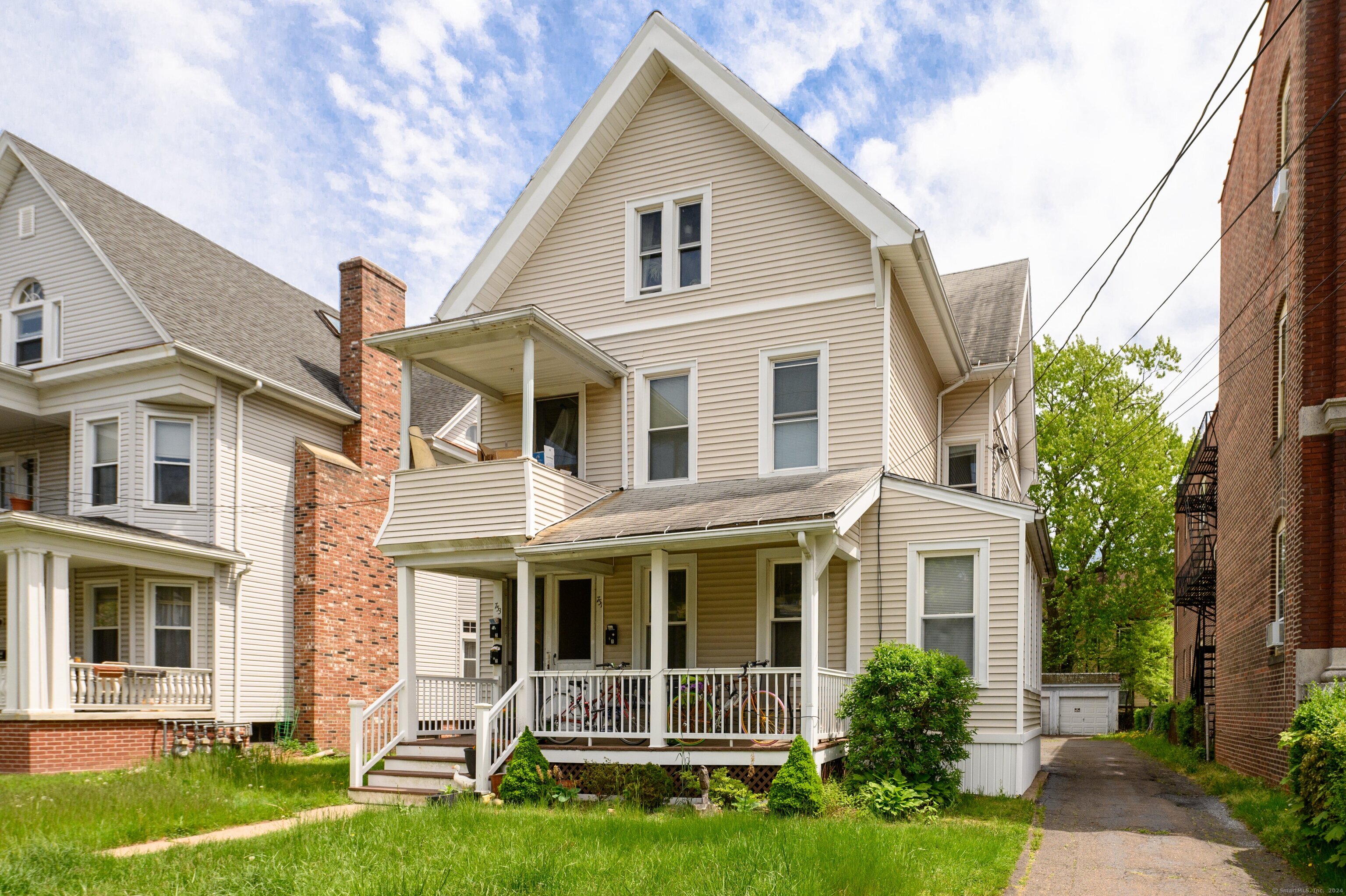 751 Orange Street New Haven, CT 06511 - Photo 3 of 18 a front view of a house with a yard