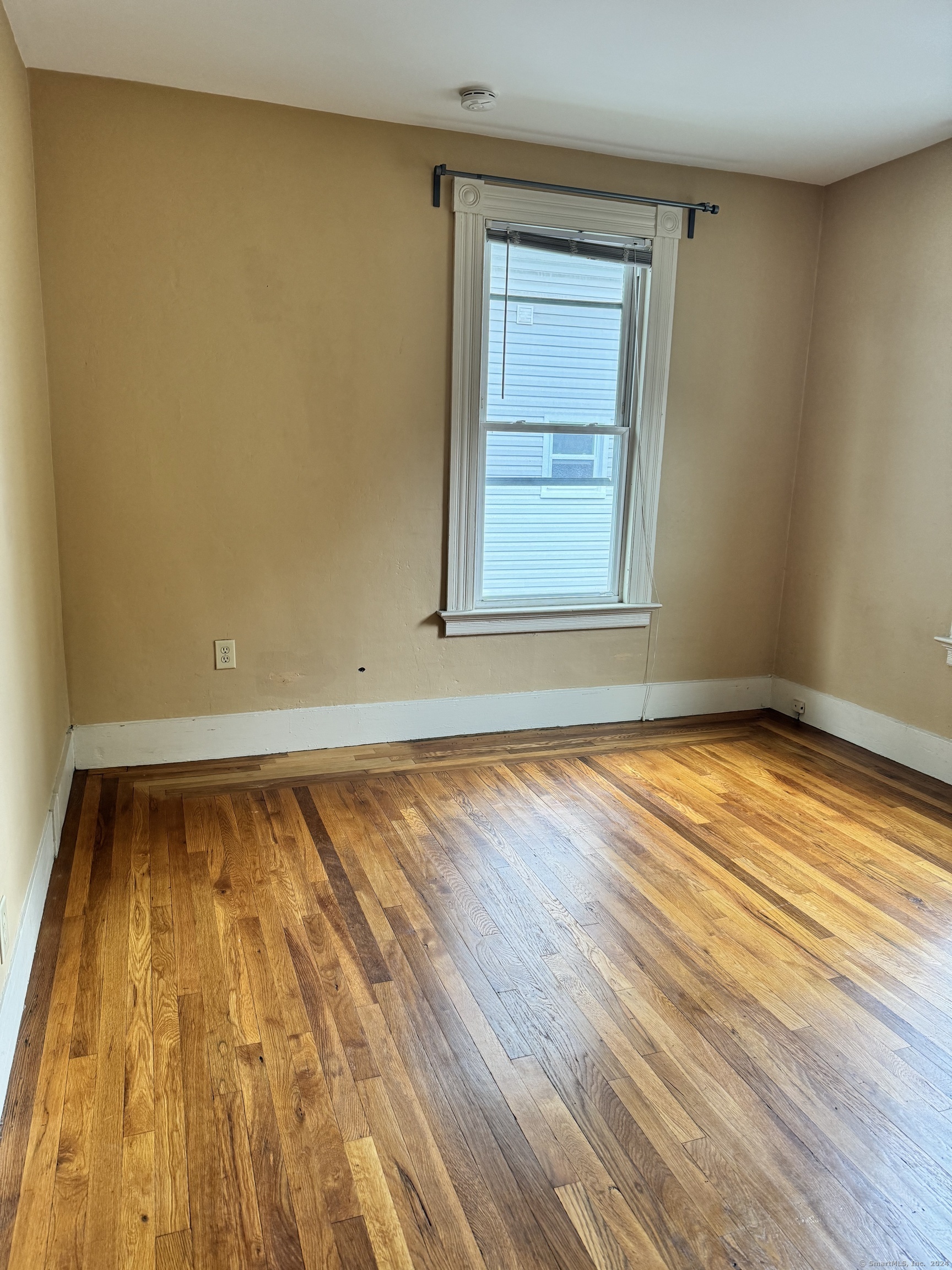 751 Orange Street New Haven, CT 06511 - Photo 6 of 18 a view of a room with wooden floor and bench