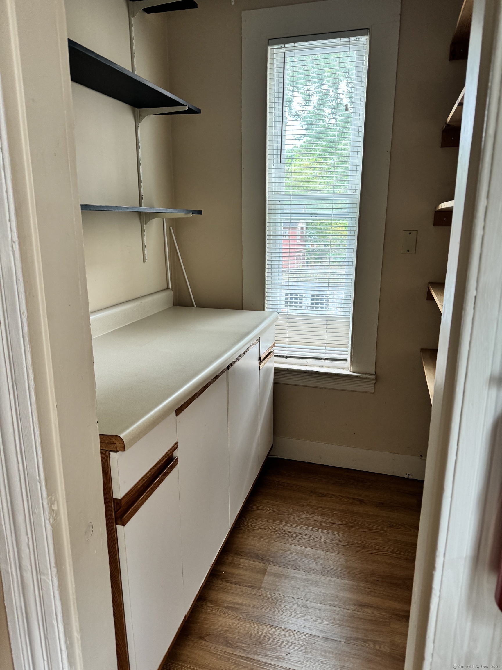 751 Orange Street New Haven, CT 06511 - Photo 9 of 18 a view of washer and dryer with wooden floor