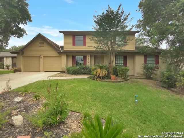 2102 Encino Loop San Antonio, TX 78259 - Photo 1 of 1 a front view of a house with garden