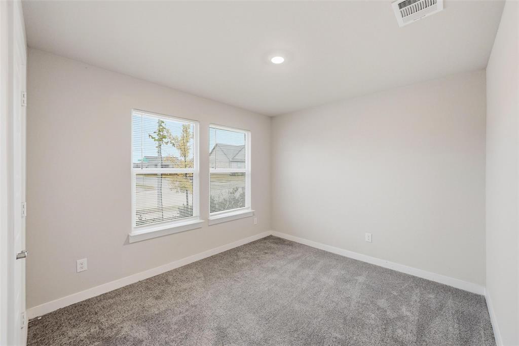 701 Griffith Pk Trail Alvarado, TX 76009 - Photo 11 of 20 an empty room with a window