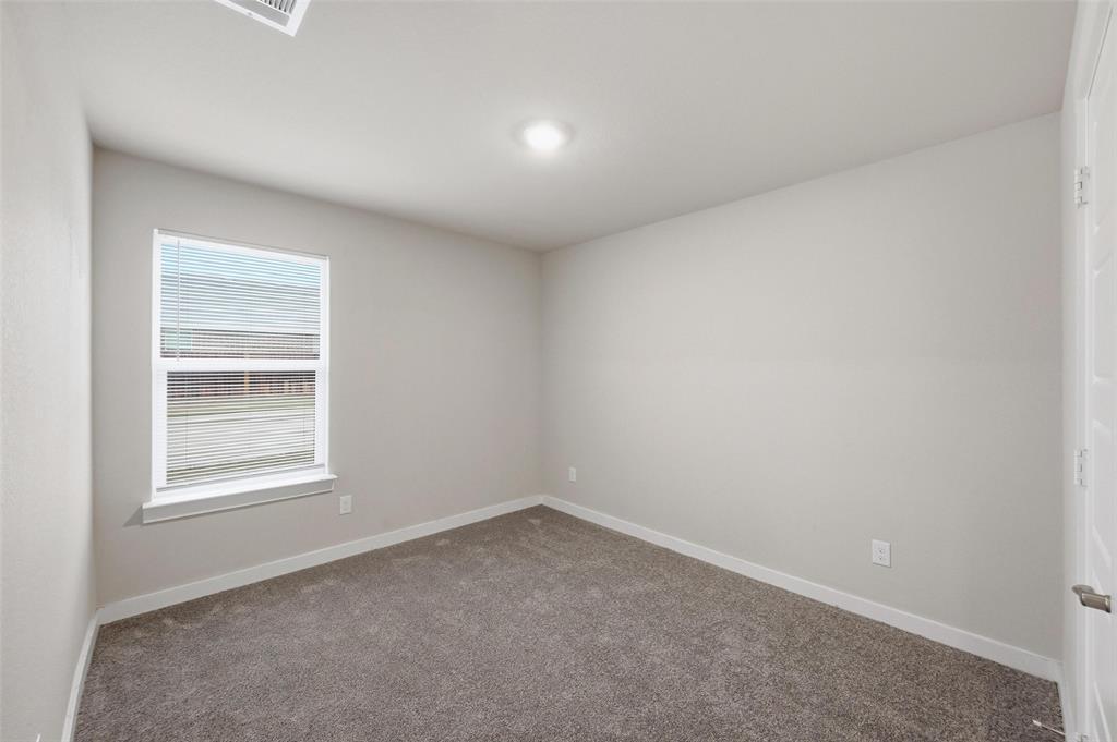 701 Griffith Pk Trail Alvarado, TX 76009 - Photo 13 of 20 an empty room with a window