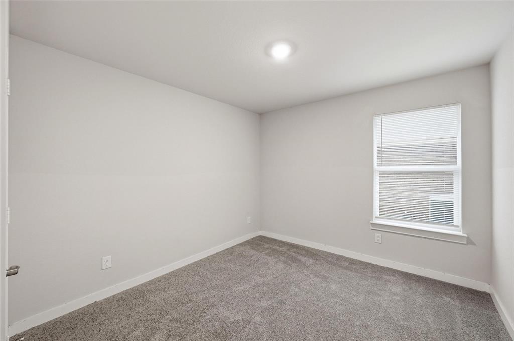 701 Griffith Pk Trail Alvarado, TX 76009 - Photo 14 of 20 an empty room with a window