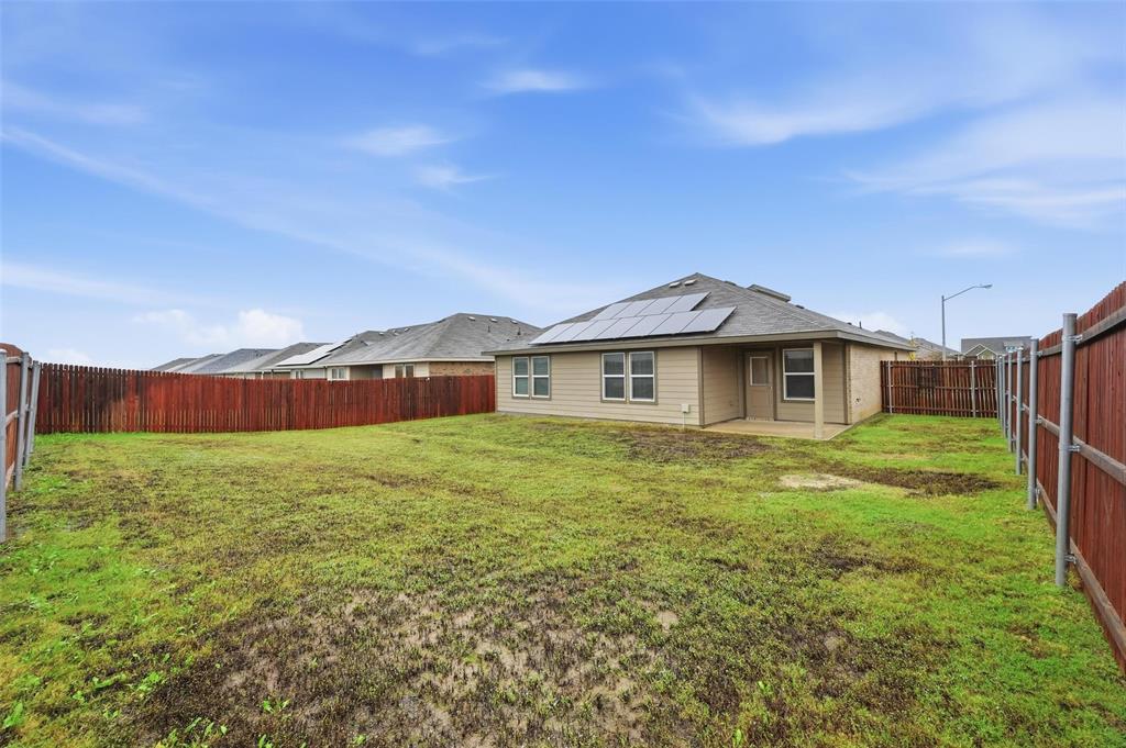 701 Griffith Pk Trail Alvarado, TX 76009 - Photo 20 of 20 a front view of a house with a yard