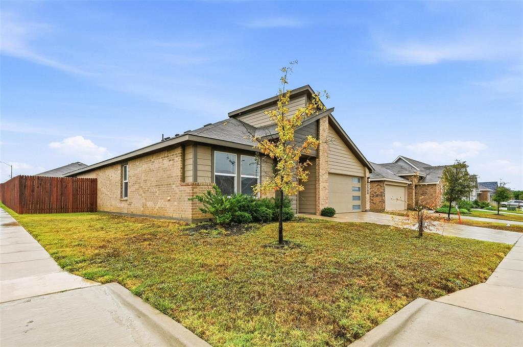 701 Griffith Pk Trail Alvarado, TX 76009 - Photo 2 of 20 a view of a house with a yard