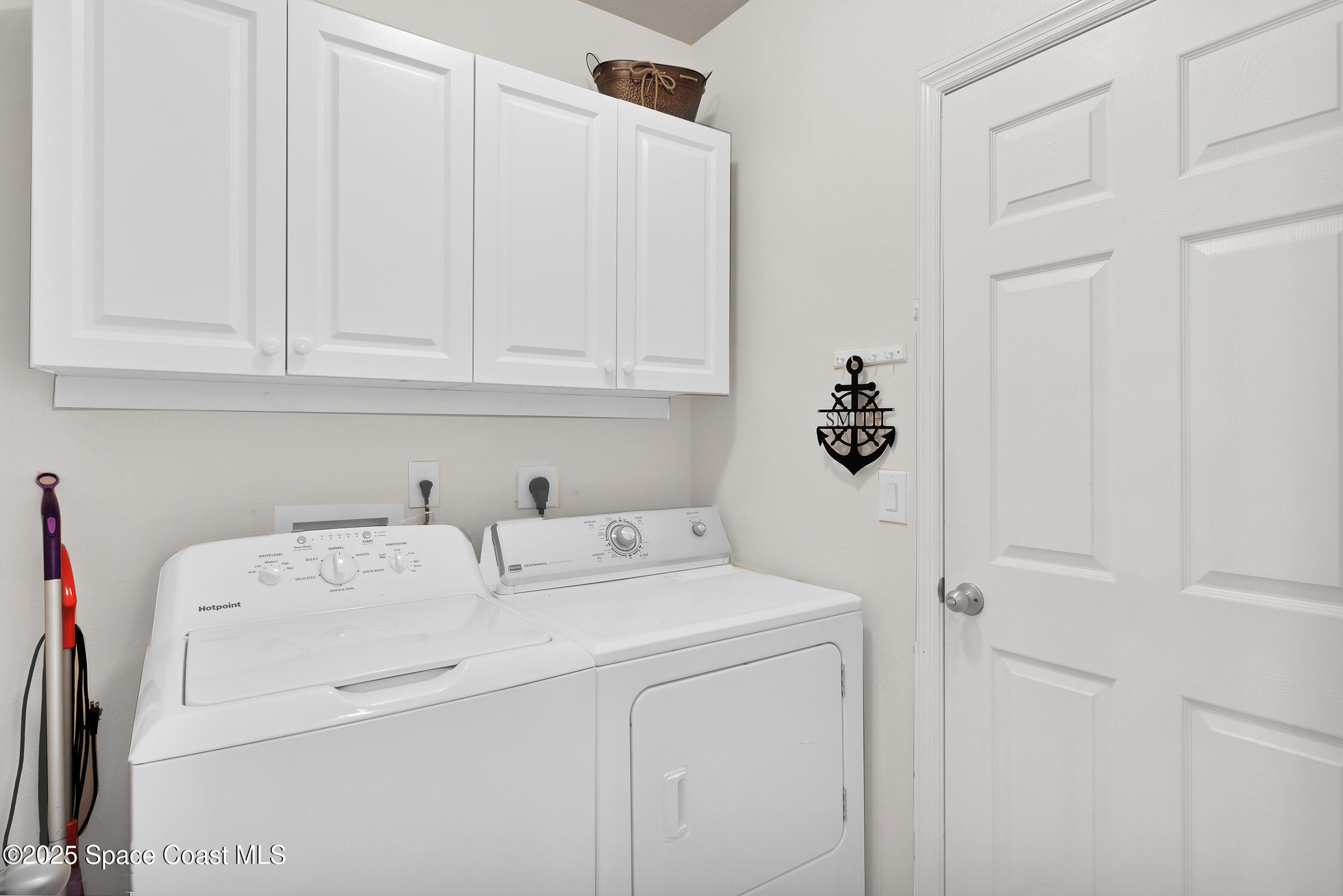 237 Briarcliff Circle Sebastian, FL 32958 - Photo 23 of 43 a utility room with dryer and washer