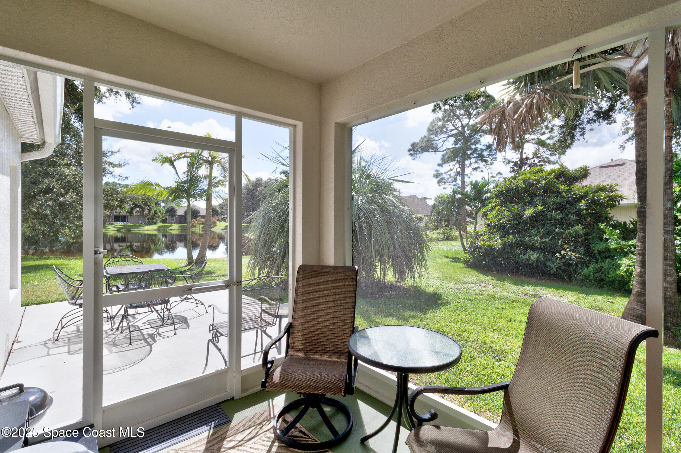 237 Briarcliff Circle Sebastian, FL 32958 - Photo 26 of 43 a view of a porch with furniture and a yard