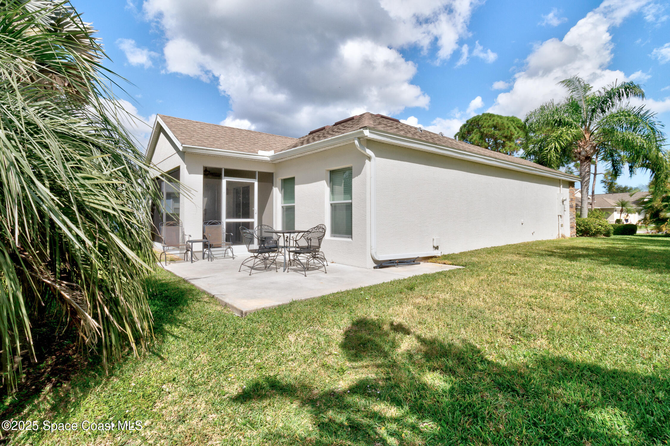 237 Briarcliff Circle Sebastian, FL 32958 - Photo 28 of 43 a view of a house with backyard and sitting area