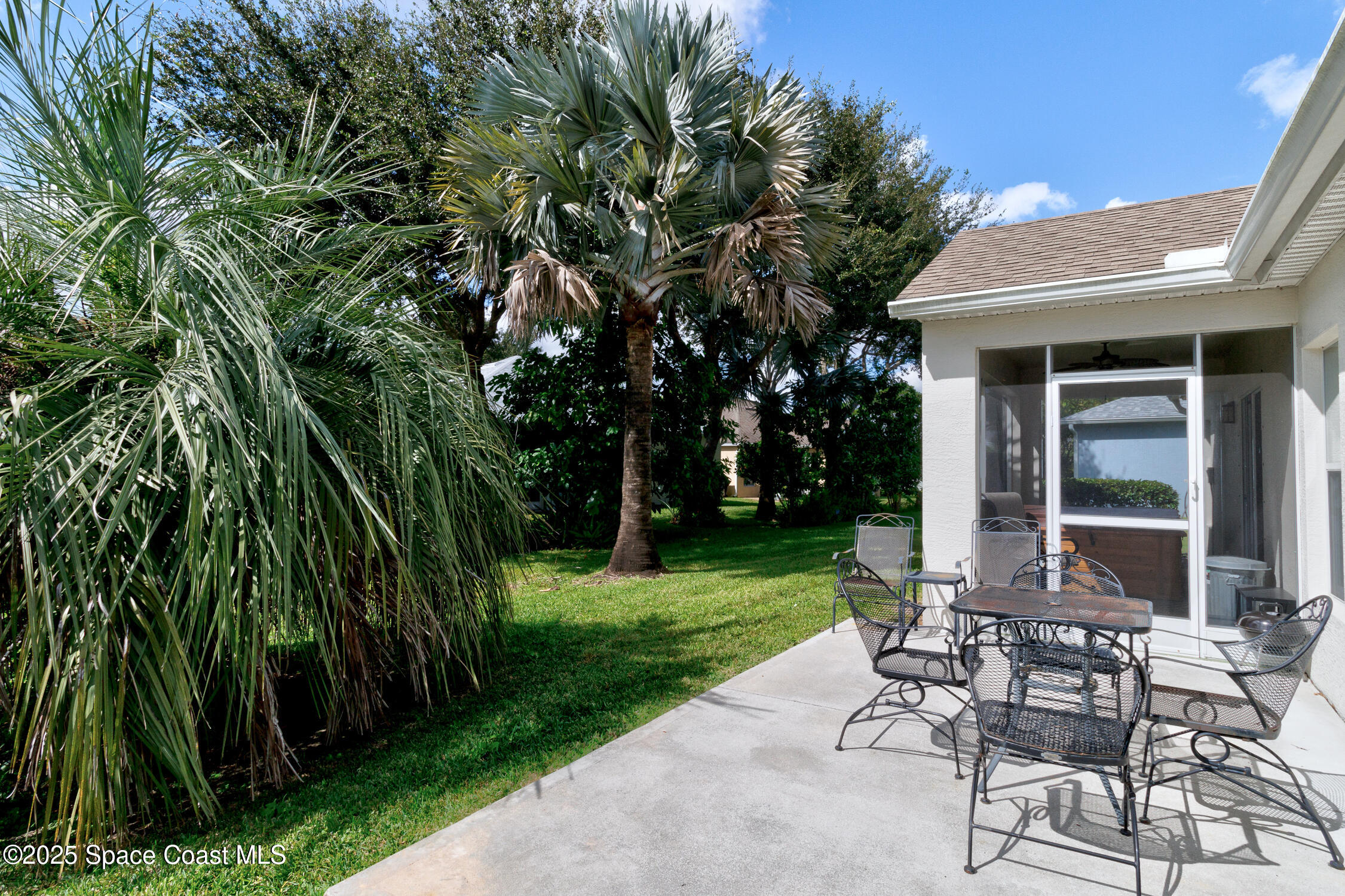 237 Briarcliff Circle Sebastian, FL 32958 - Photo 30 of 43 a view of a house with backyard and sitting area