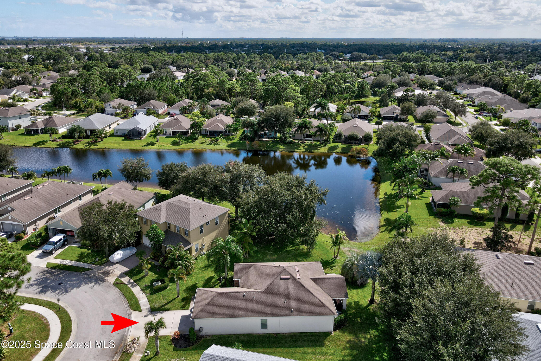 237 Briarcliff Circle Sebastian, FL 32958 - Photo 33 of 43 an aerial view of a house with a lake view