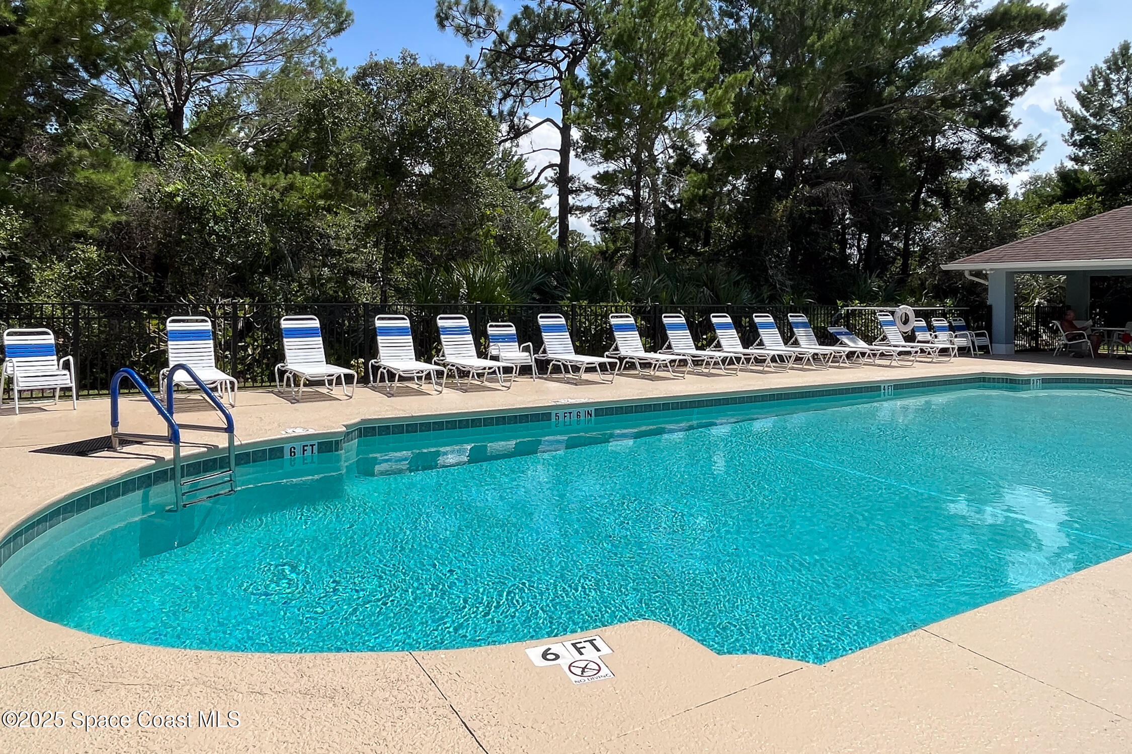 237 Briarcliff Circle Sebastian, FL 32958 - Photo 41 of 43 a view of a swimming pool with a patio