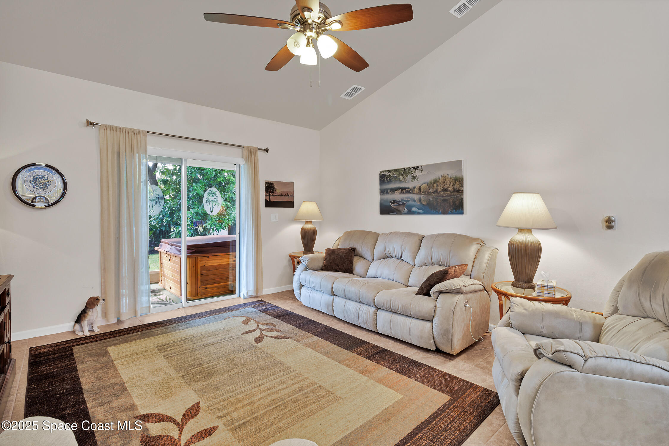 237 Briarcliff Circle Sebastian, FL 32958 - Photo 5 of 43 a living room with furniture and a large window