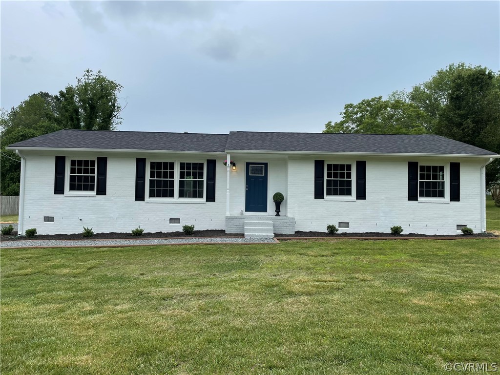 2731 Kinvan Road Henrico, VA 23231 - Photo 1 of 27 a house that has a big yard