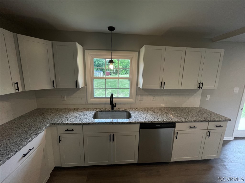 2731 Kinvan Road Henrico, VA 23231 - Photo 12 of 27 a kitchen with granite countertop cabinets stainless steel appliances a sink and a window