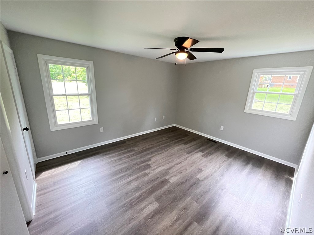 2731 Kinvan Road Henrico, VA 23231 - Photo 15 of 27 a view of empty room with wooden floor and fan