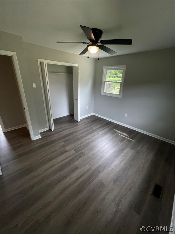 2731 Kinvan Road Henrico, VA 23231 - Photo 17 of 27 an empty room with wooden floor and windows
