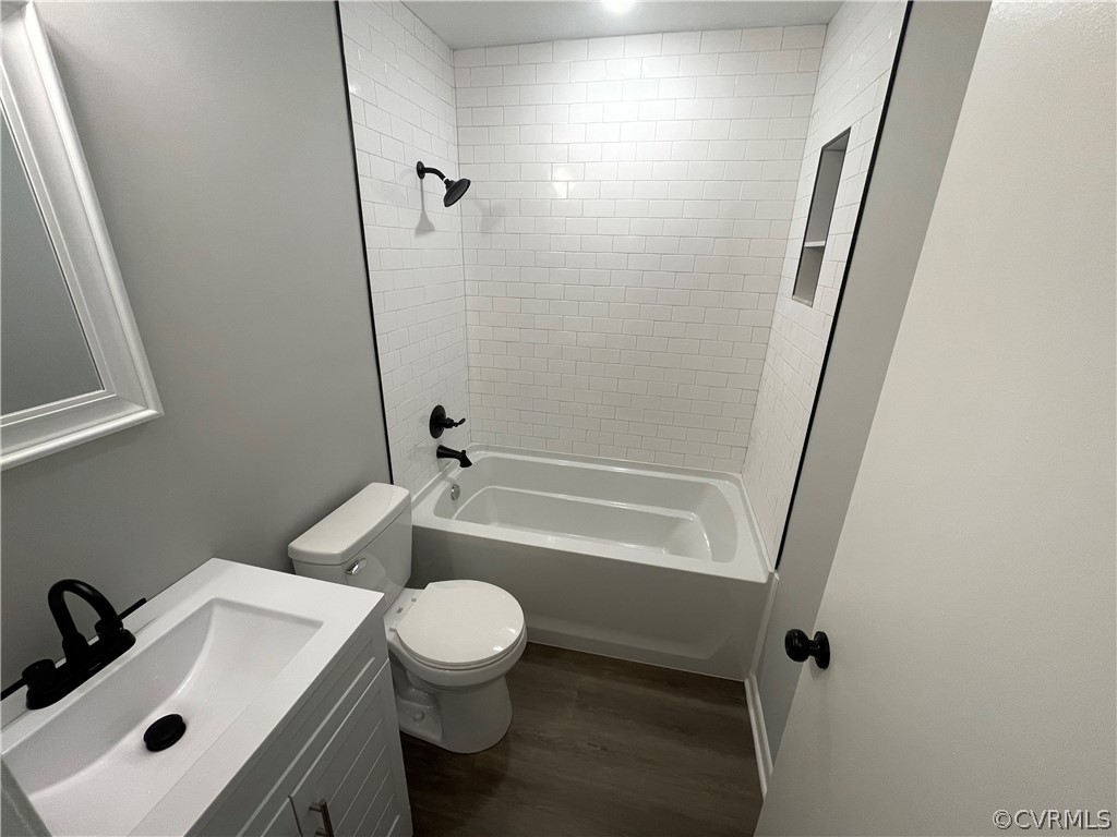 2731 Kinvan Road Henrico, VA 23231 - Photo 21 of 27 a bathroom with a sink toilet and shower