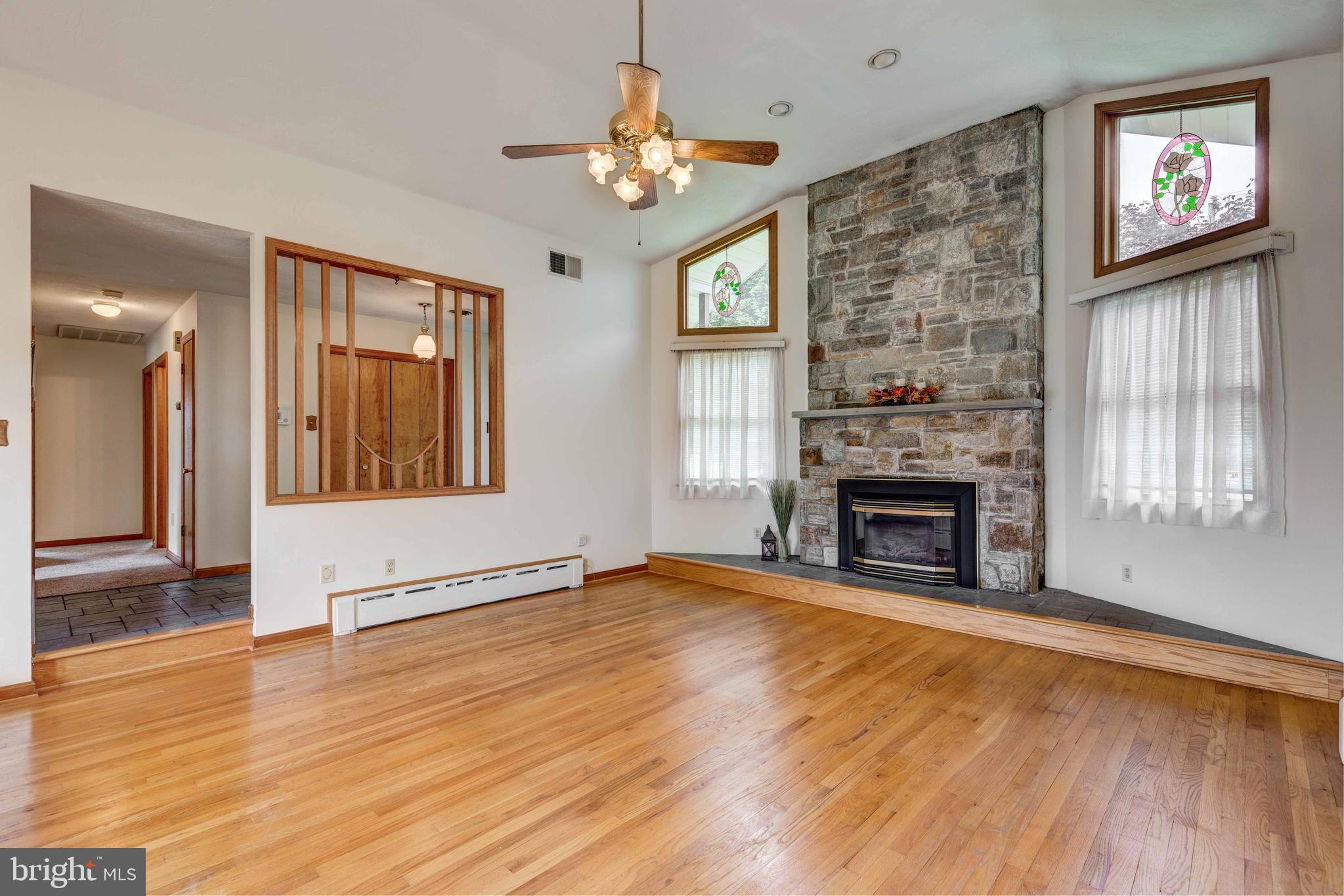 2507 Bachmans Valley Road Manchester, MD 21102 - Photo 10 of 43 Gleaming Hardwoods and Gas Stone Fireplace