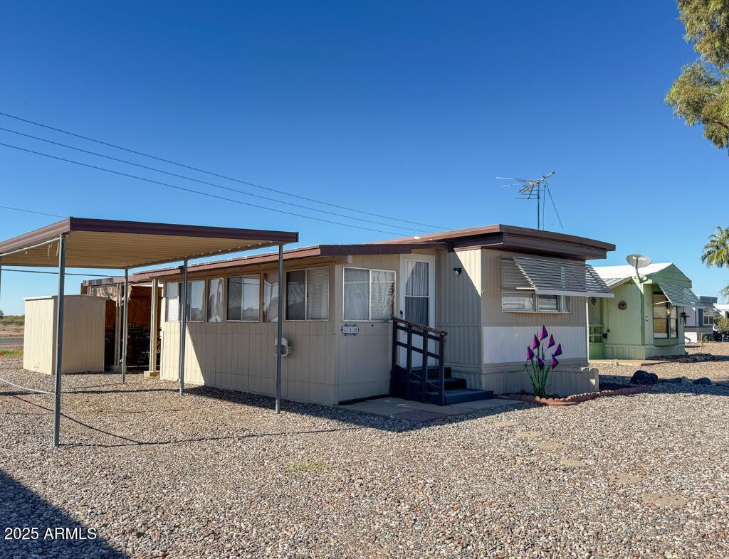 a view of a house with a patio