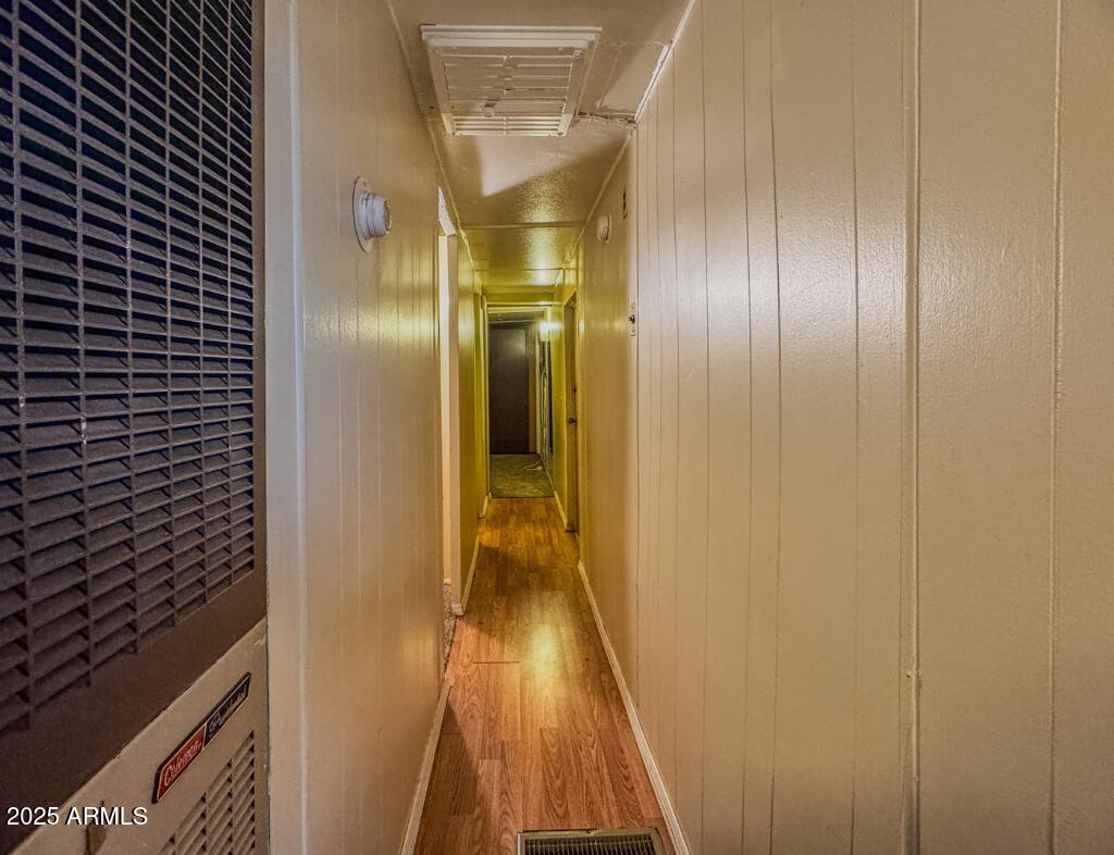 11100 West Alsdorf Road, Unit 10 Arizona City, AZ 85123 - Photo 17 of 19 a view of gallery with wooden floor