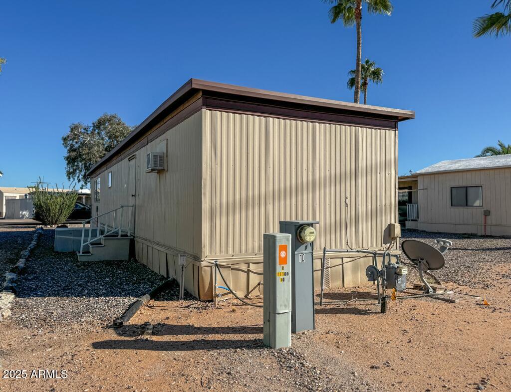 11100 West Alsdorf Road, Unit 10 Arizona City, AZ 85123 - Photo 18 of 19 a front view of a house with garden