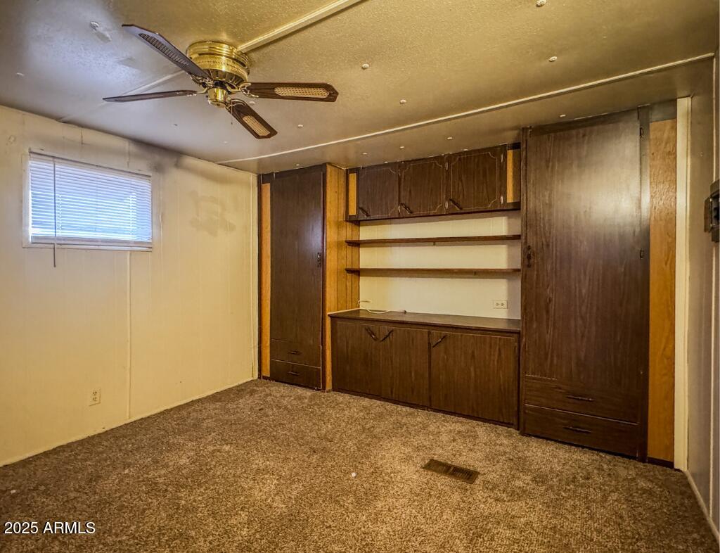 11100 West Alsdorf Road, Unit 10 Arizona City, AZ 85123 - Photo 5 of 19 a view of walk in closet