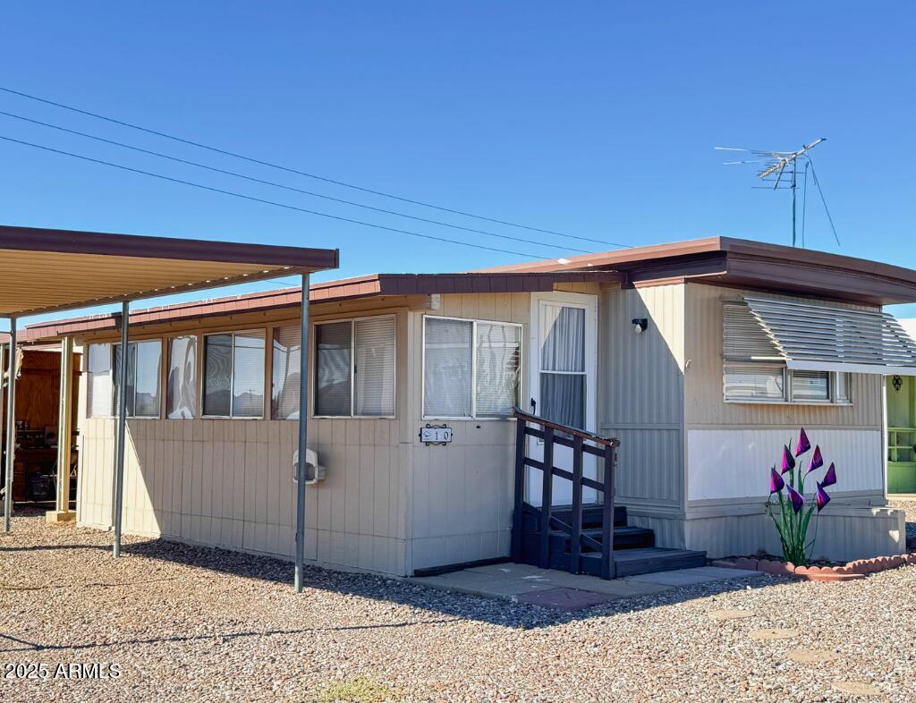 11100 West Alsdorf Road, Unit 10 Arizona City, AZ 85123 - Photo 10 of 19 a view of a house with a porch