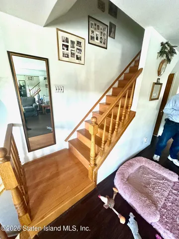 a view of backyard with seating area and green space