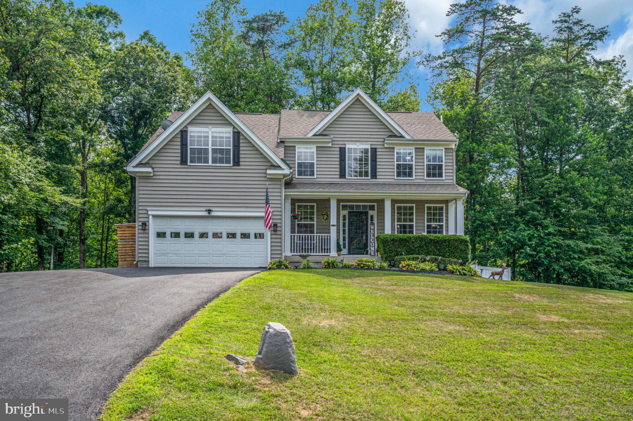 239 Toluca Road Stafford, VA 22556 - Photo 9 of 75 Charming home nestled in lush greenery.