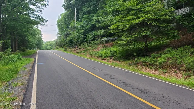 a view of a garden from a balcony