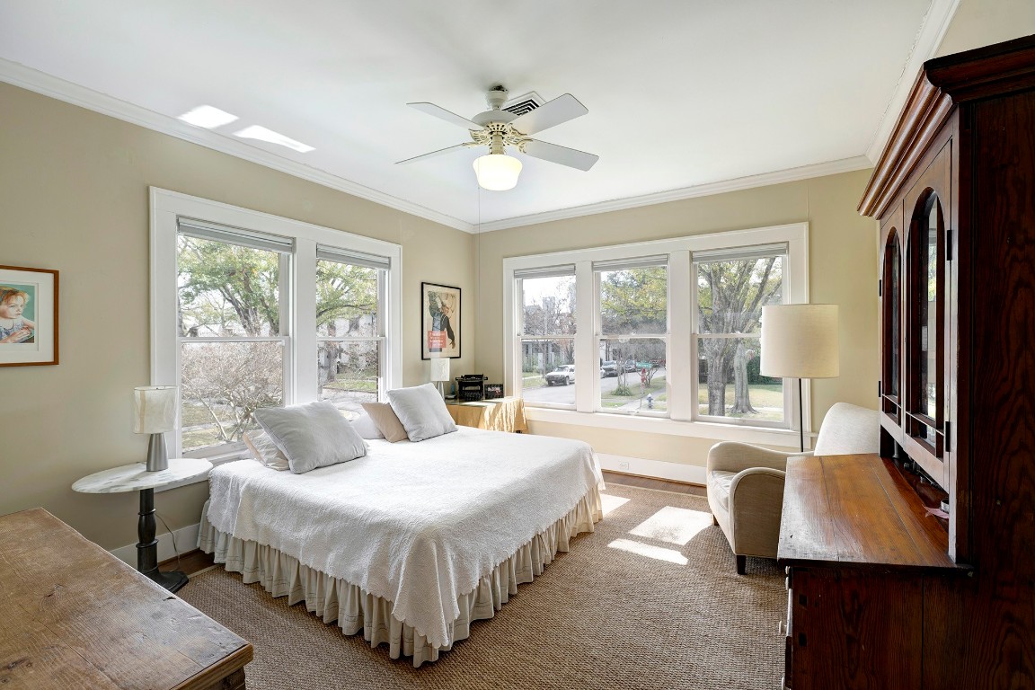 1902 Bolsover Street Houston, TX 77005 - Photo 17 of 27 Secondary bedroom features windows on two sides that fill the space with natural light and offer neighborhood views.