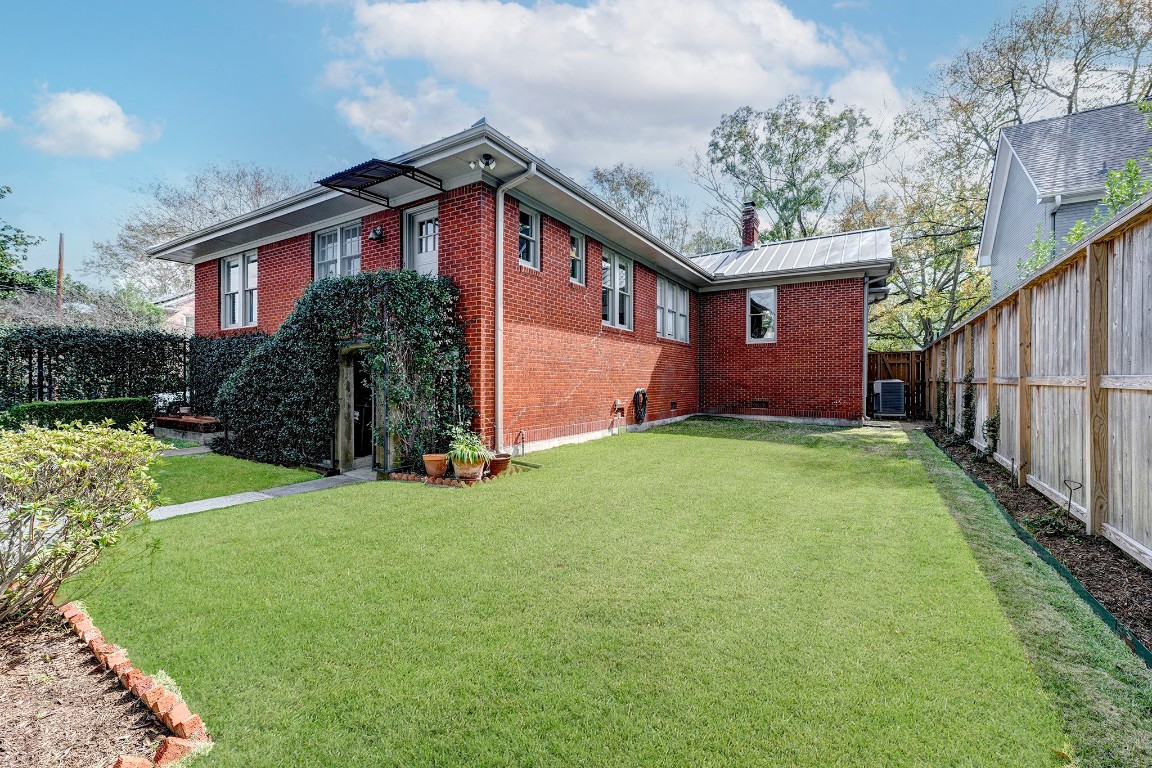 1902 Bolsover Street Houston, TX 77005 - Photo 21 of 27 Enjoy the outdoors in a large fenced backyard with plenty of green space for pets, play, or gardening.