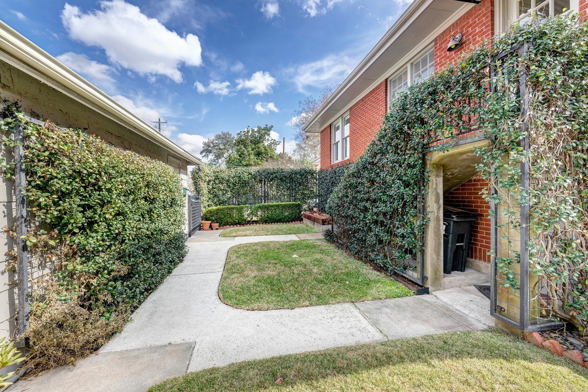 1902 Bolsover Street Houston, TX 77005 - Photo 23 of 27 Under-stair space provides a discreet spot for trashcan storage.