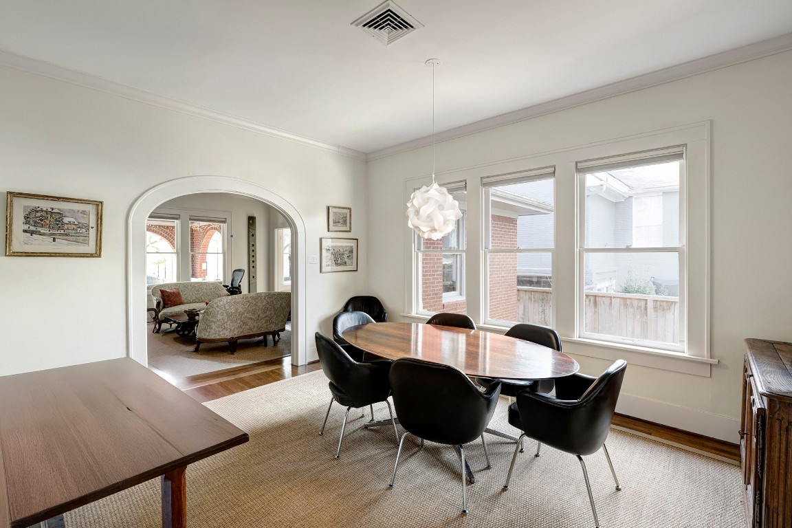1902 Bolsover Street Houston, TX 77005 - Photo 6 of 27 The arched opening between the living and dining rooms provides a nice layout for everyday living and entertaining.