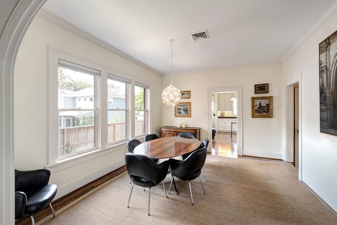 1902 Bolsover Street Houston, TX 77005 - Photo 7 of 27 Looking from the dining room toward the kitchen, the space offers flexibility for a range of dining furniture styles and layouts.