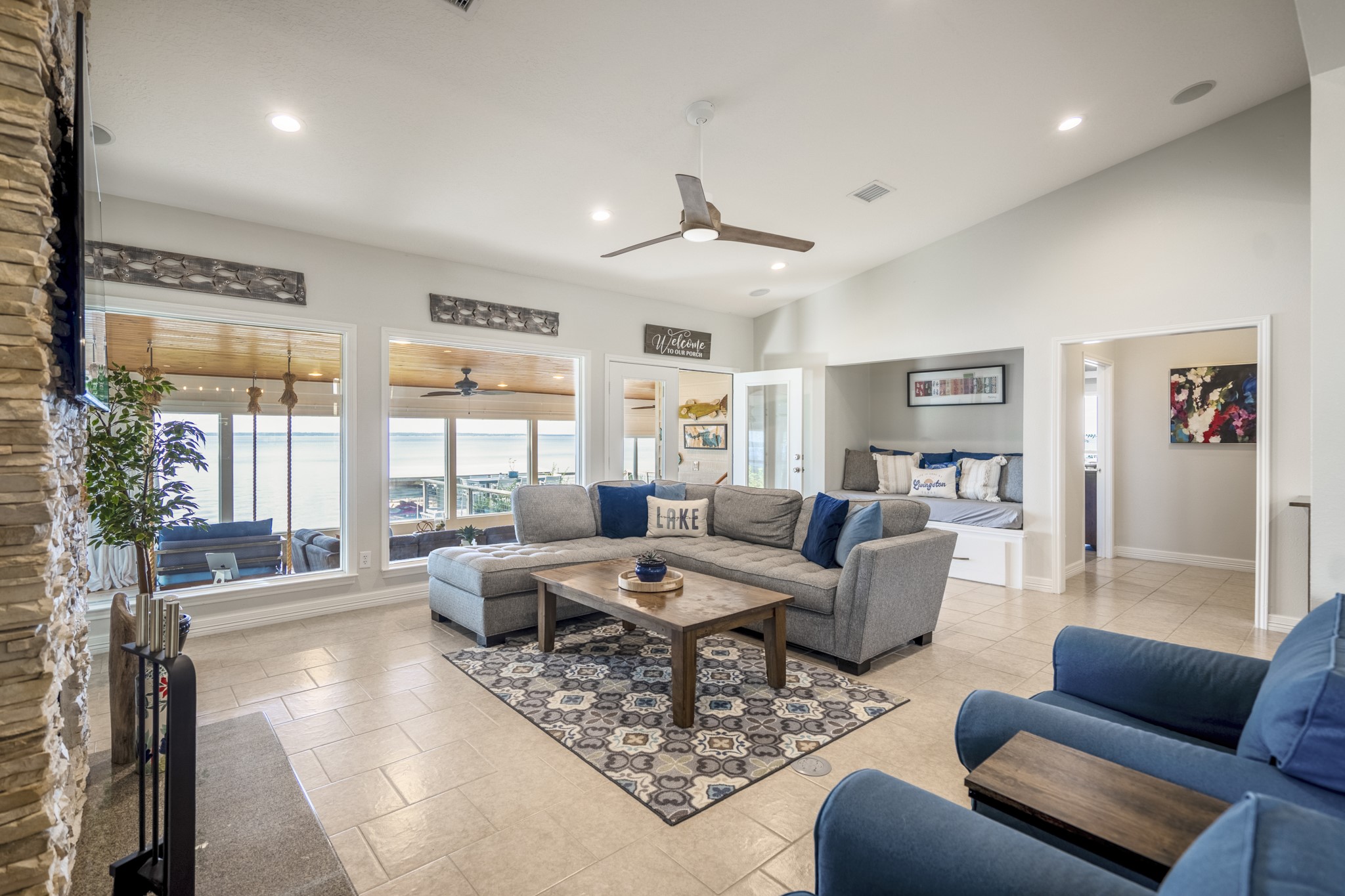 615 Inlet Drive Livingston, TX 77351 - Photo 14 of 50 a living room with furniture or couches and a large window