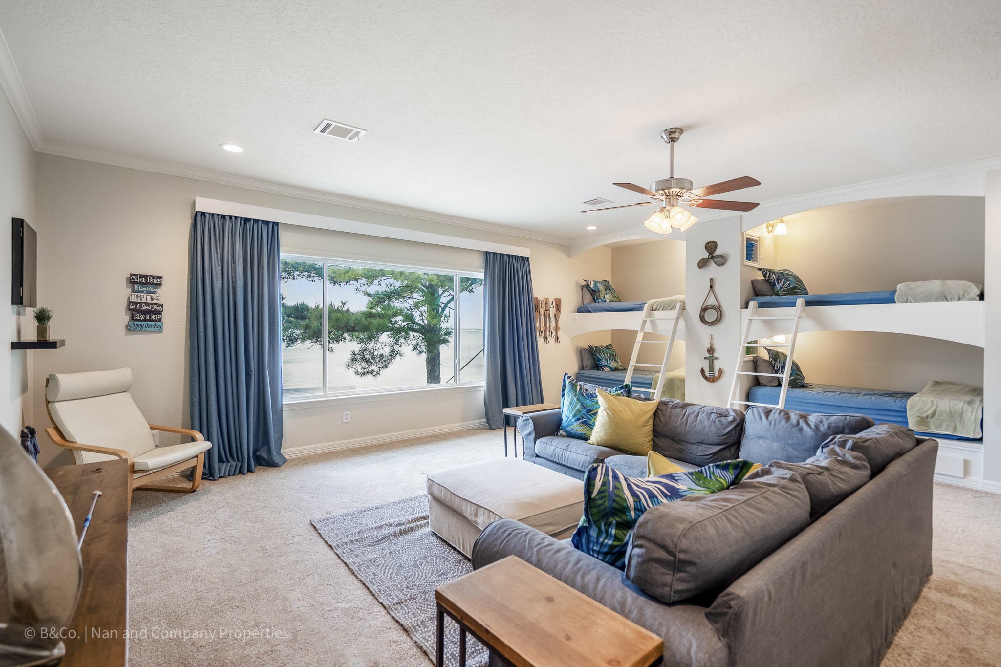 615 Inlet Drive Livingston, TX 77351 - Photo 30 of 50 a living room with furniture and a large window