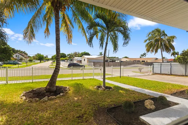 a view of a backyard with a slide