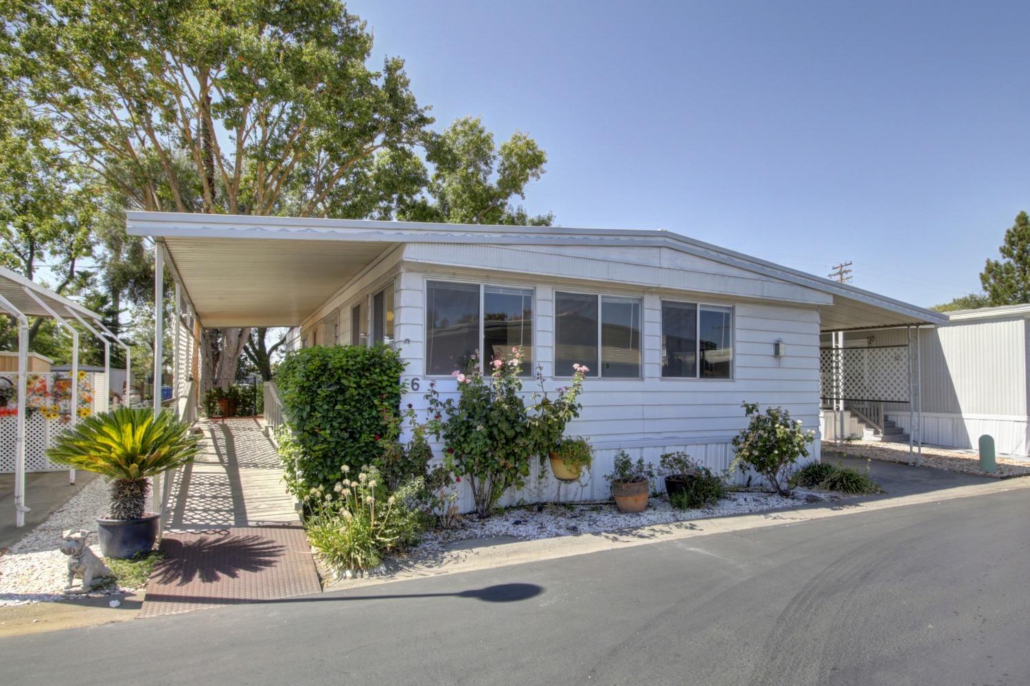 5040 Jackson Street, Unit 6 North Highlands, CA 95660 - Photo 1 of 1 front view of a house with a street