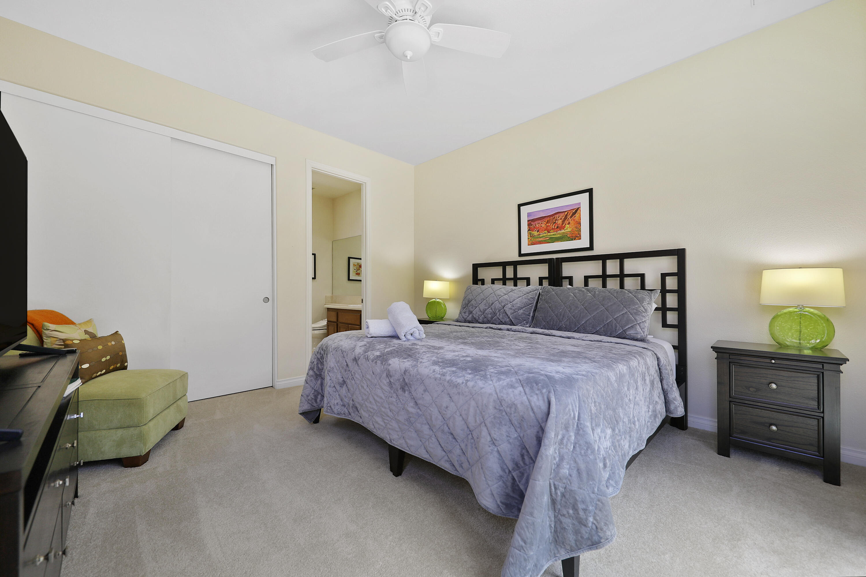 54048 Riviera La Quinta, CA 92253 - Photo 26 of 39 a bedroom with a bed and dresser