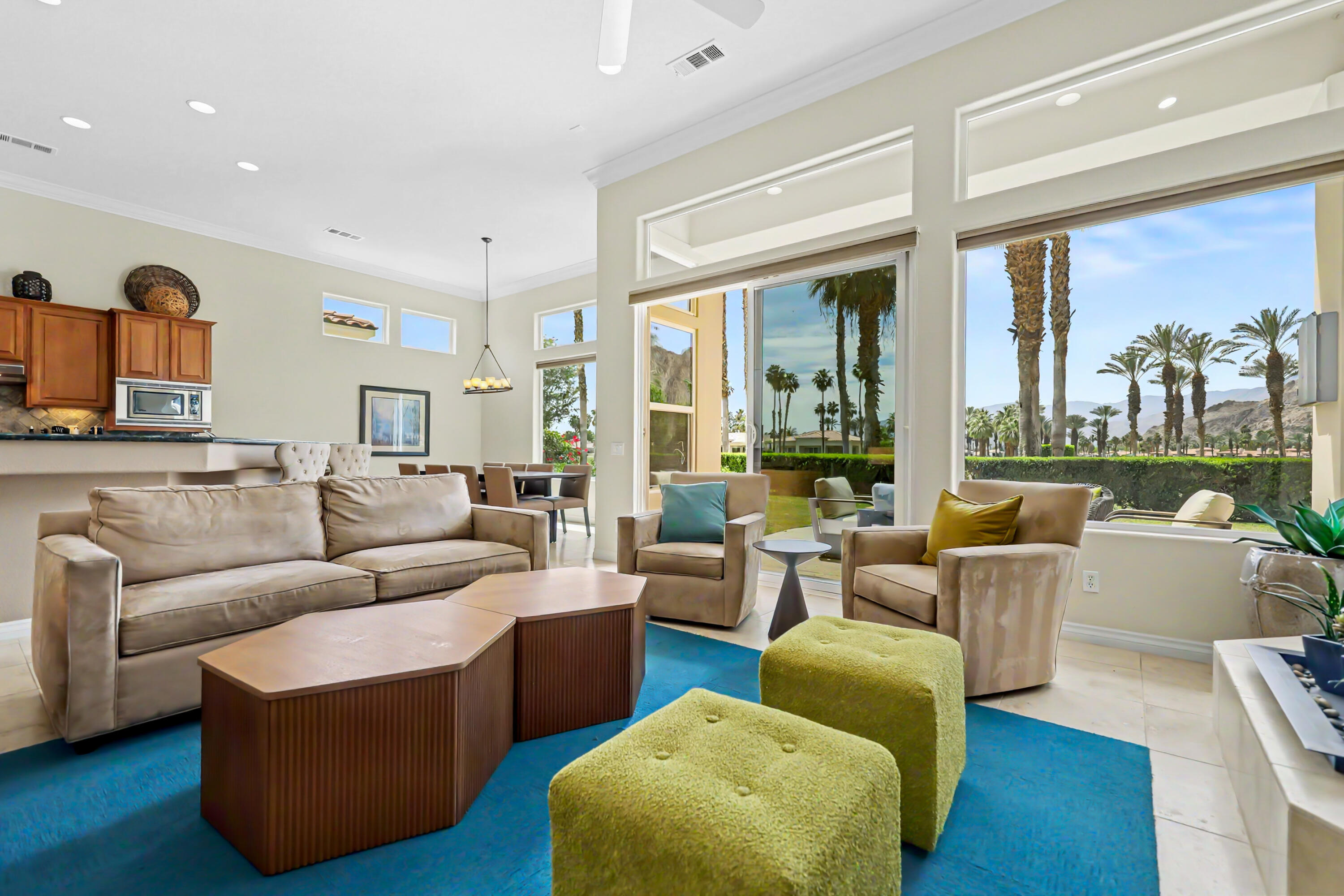 54048 Riviera La Quinta, CA 92253 - Photo 9 of 39 a living room with furniture and a large window