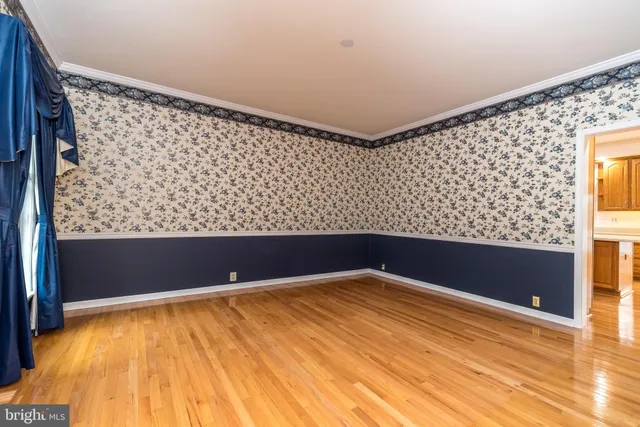 a view of an empty room and window