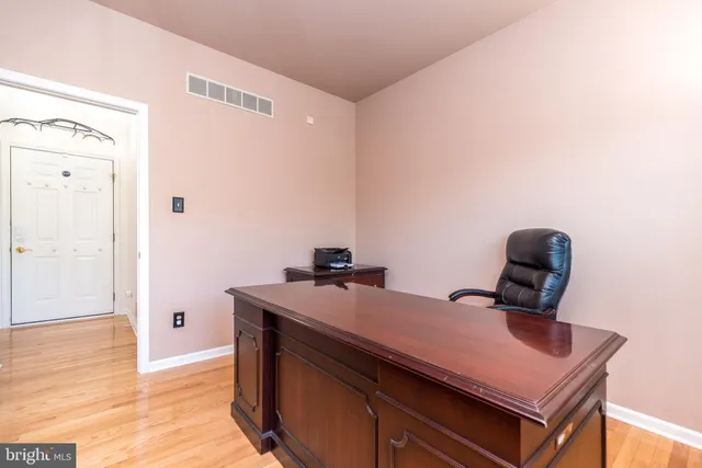 a view of entryway with wooden floor
