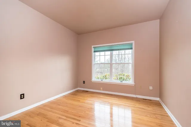 a bathroom with a sink vanity and mirror