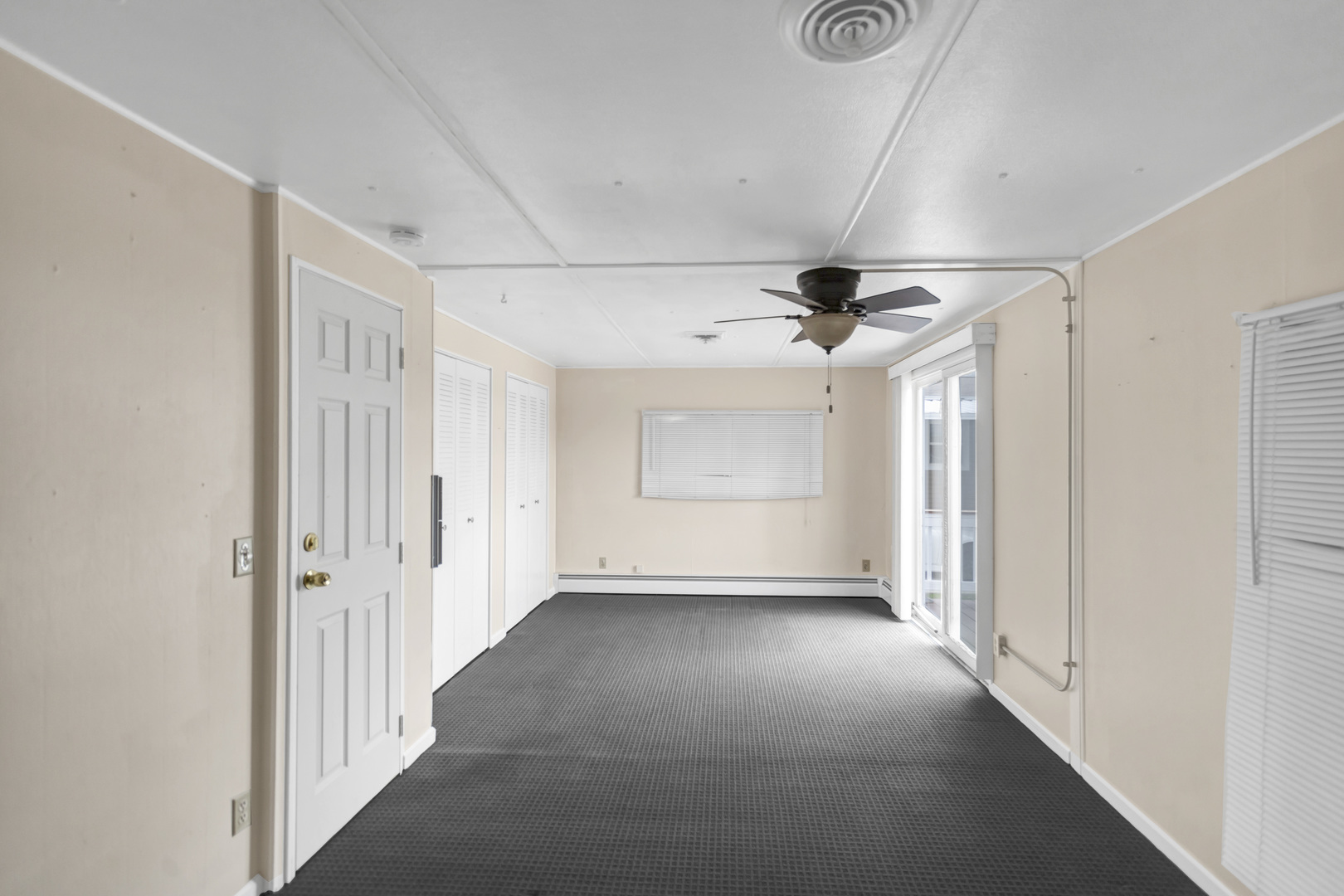 1053 Lakeview Road Elgin, IL 60123 - Photo 18 of 33 a view of a livingroom with a ceiling fan and window