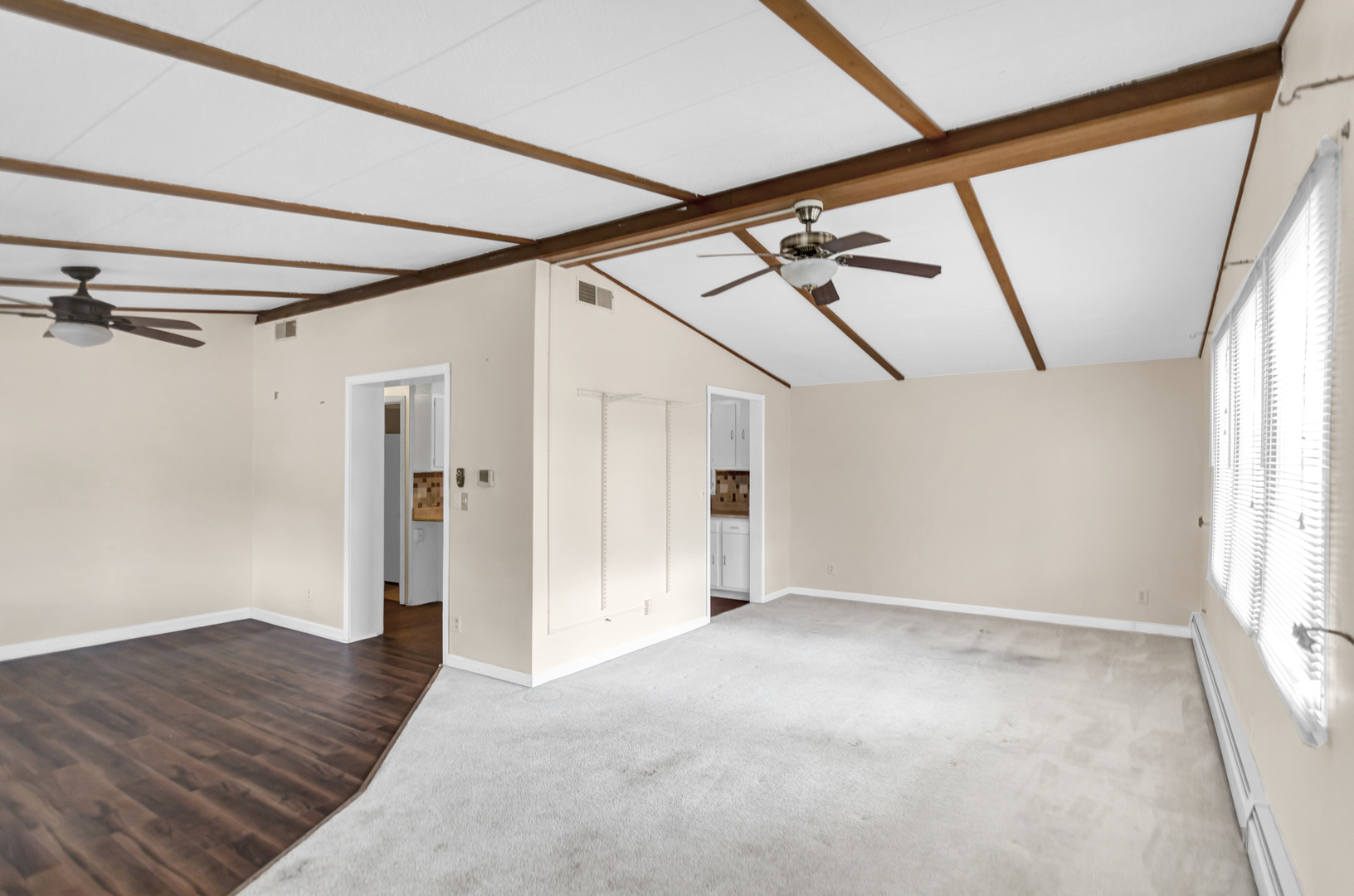 1053 Lakeview Road Elgin, IL 60123 - Photo 7 of 33 a view of hallway with wooden floor and stairs